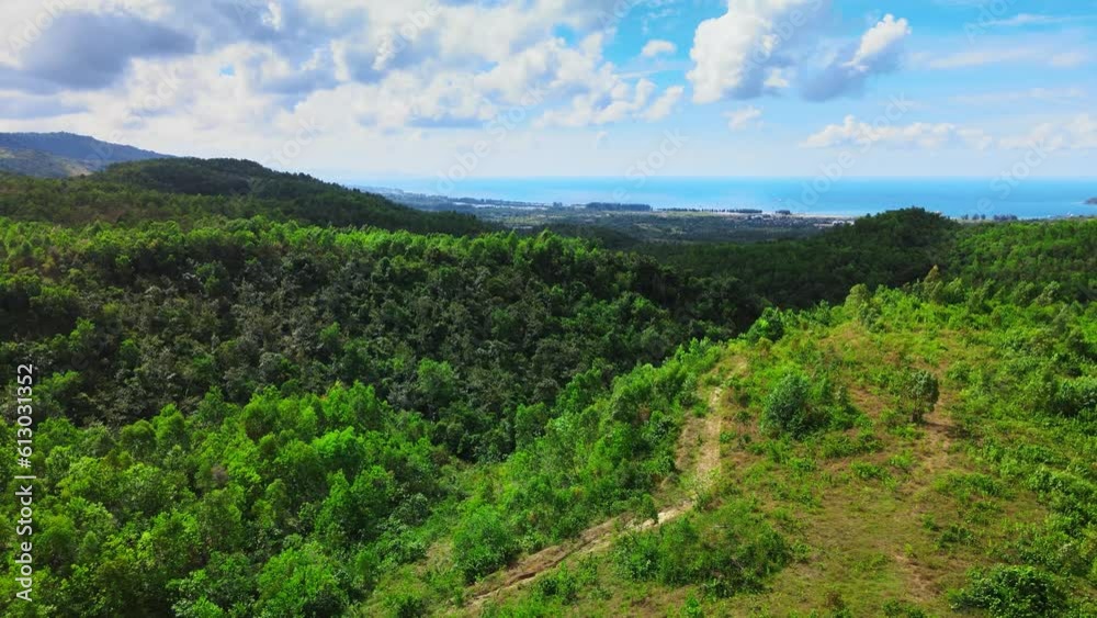 A mountain with blue sea water far in the front of the scenery A mountain with blue sea water far in the front of the scenery
