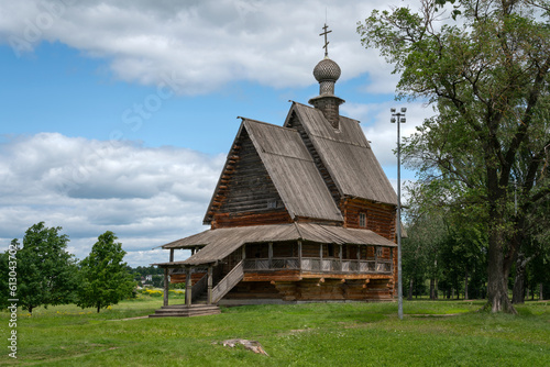 View of the wooden St. Nicholas Church from the village of Glotovo transported to the territory of the Suzdal Kremlin on a sunny summer day, Suzdal, Vladimir region, Russia