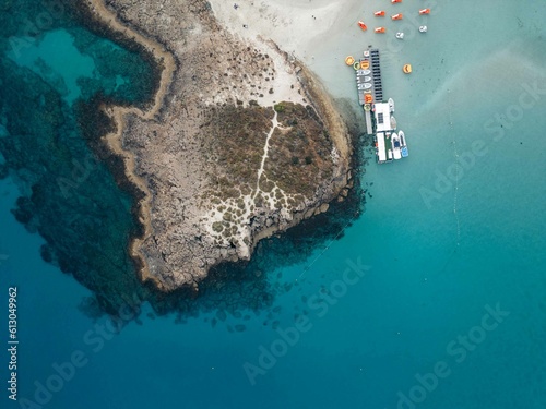 Sea shore in Cyprus with floating boats 