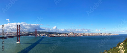 Scenic panoramic view of Lisbon and April 25th suspension bridge over Tagus river from viewpoint at Almada, Portugal