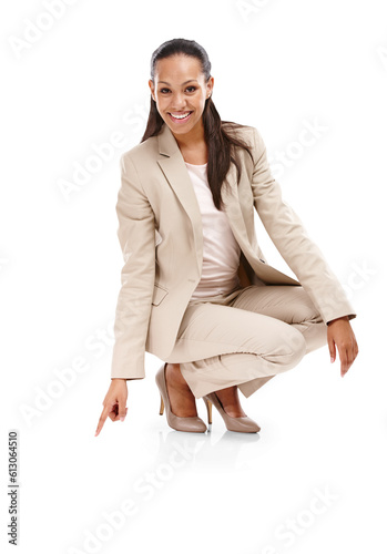 Business woman, crouch and pointing down, direction and advertising with signage isolated on transparent png background. Sign, show and corporate branding with female employee, portrait and smile