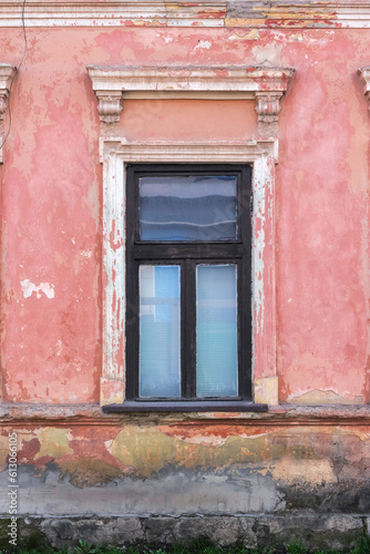 vintage windows on the old facade. abandoned architecture exterior
