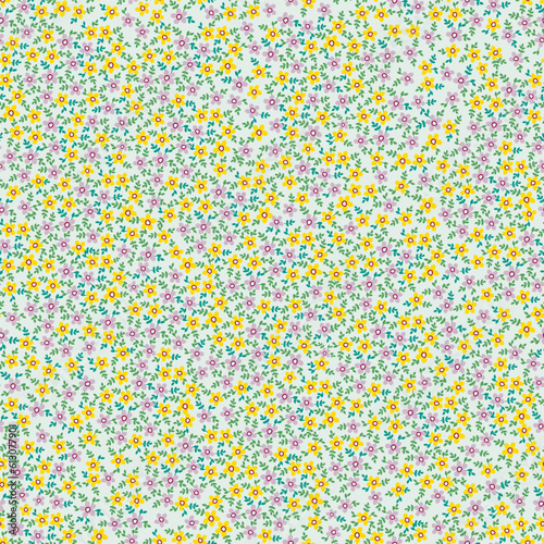 Vector illustration. Seamless pattern of many hand-drawn yellow and purple flowers on a light green background.