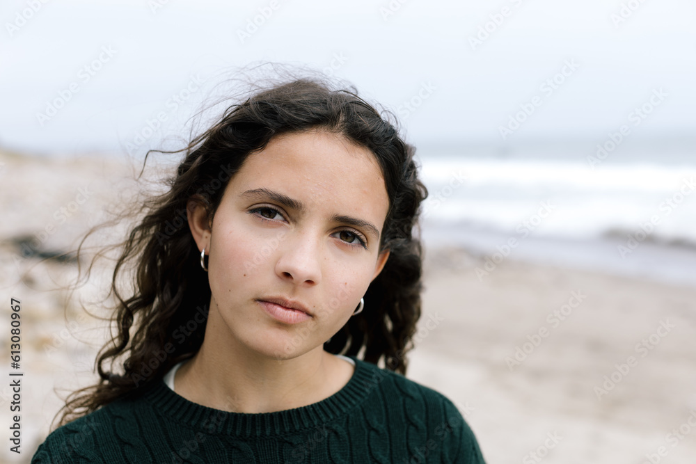 Teen Girl With A Serious Expression At The Beach Teen Girl With A Serious Expression At The Beach