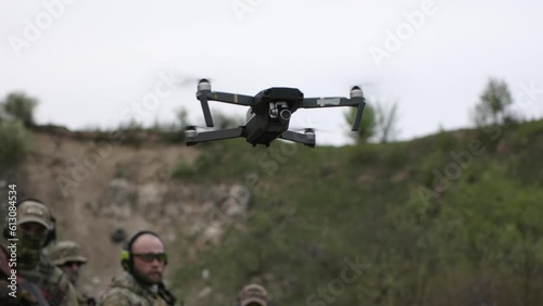 Company of Ukrainian militarymen with a drone photo