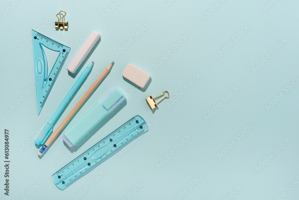 School supplies on blue background. Back to school concept. Top view. Copy space. School supplies on blue background. Back to school concept. Top view. Copy space.