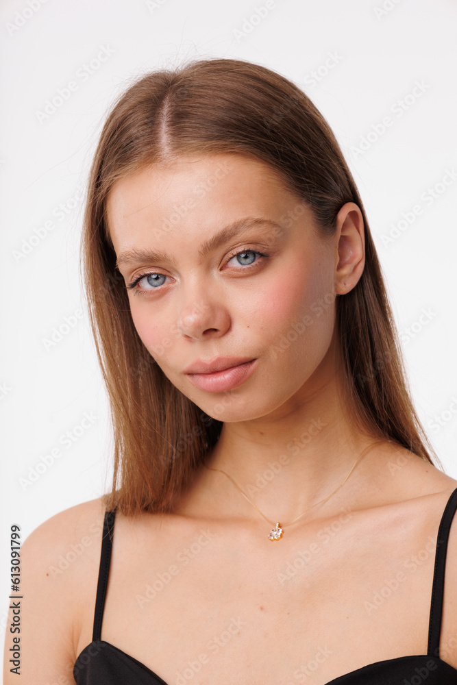 Beautiful young girl with fresh healthy skin. Woman advertise ear-rings. White background. Earrings closeup. Blond european woman with long hair with big lips, pretty smile. Cosmetology, scincare Beautiful young girl with fresh healthy skin. Woman advertise ear-rings. White background. Earrings closeup. Blond european woman with long hair with big lips, pretty smile. Cosmetology, scincare