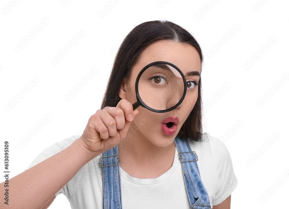 Curious young woman looking through magnifier glass on white background Curious young woman looking through magnifier glass on white background