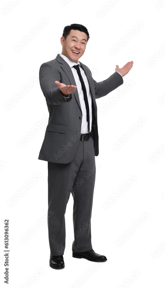Businessman in suit posing on white background Businessman in suit posing on white background