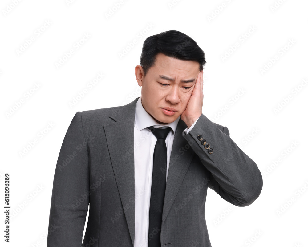 Tired businessman in suit posing on white background Tired businessman in suit posing on white background