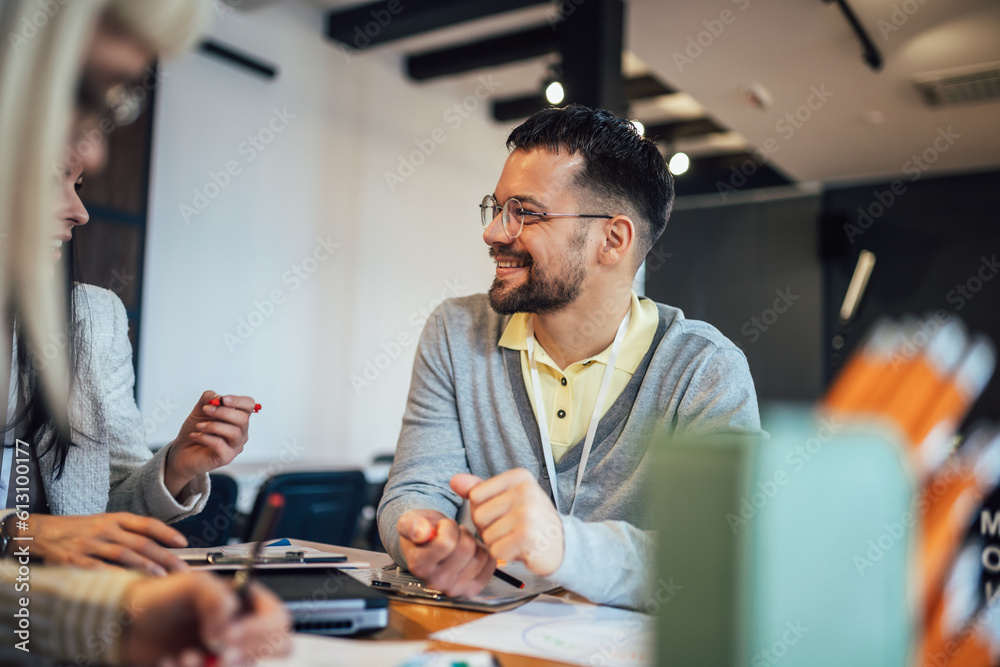 Modern business team discussing new ideas at the office. Business people on meeting in modern office. Modern business team discussing new ideas at the office. Business people on meeting in modern office.