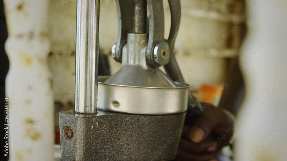 Lemon being squeezed to make a delicious smoohtie on a beach in The Gambia. Lemon being squeezed to make a delicious smoohtie on a beach in The Gambia.