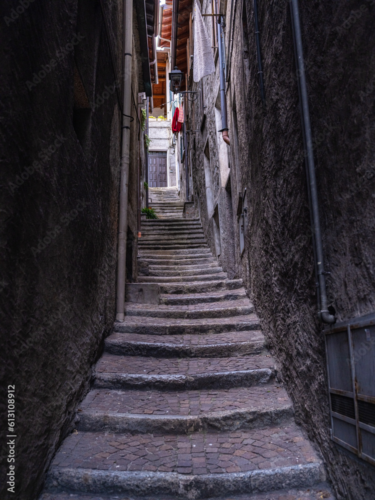 narrow steps between houses in Italy