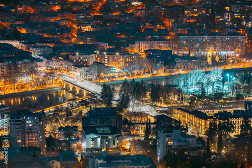 Tbilisi, Georgia. Elevated top Scenic View city night traffic. Georgian Capital Skyline Cityscape Night time.