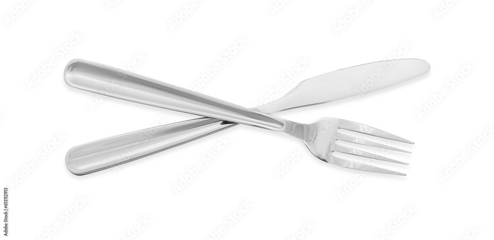 Knife and fork isolated on white, top view. Stylish shiny cutlery set Knife and fork isolated on white, top view. Stylish shiny cutlery set