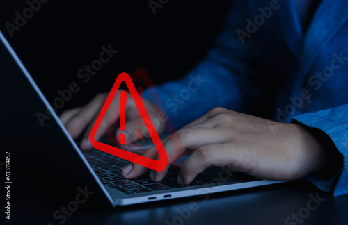 Businessman or employee with warning triangle sign for warning error Hack Alert System Warning cyber attack	
