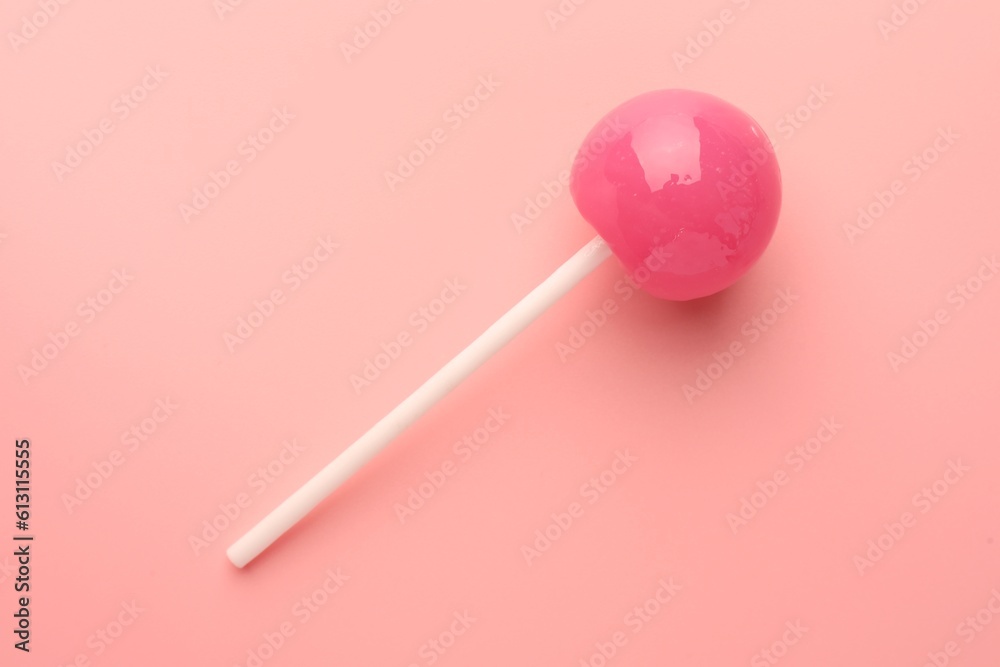 Tasty lollipop on pink background, top view Tasty lollipop on pink background, top view