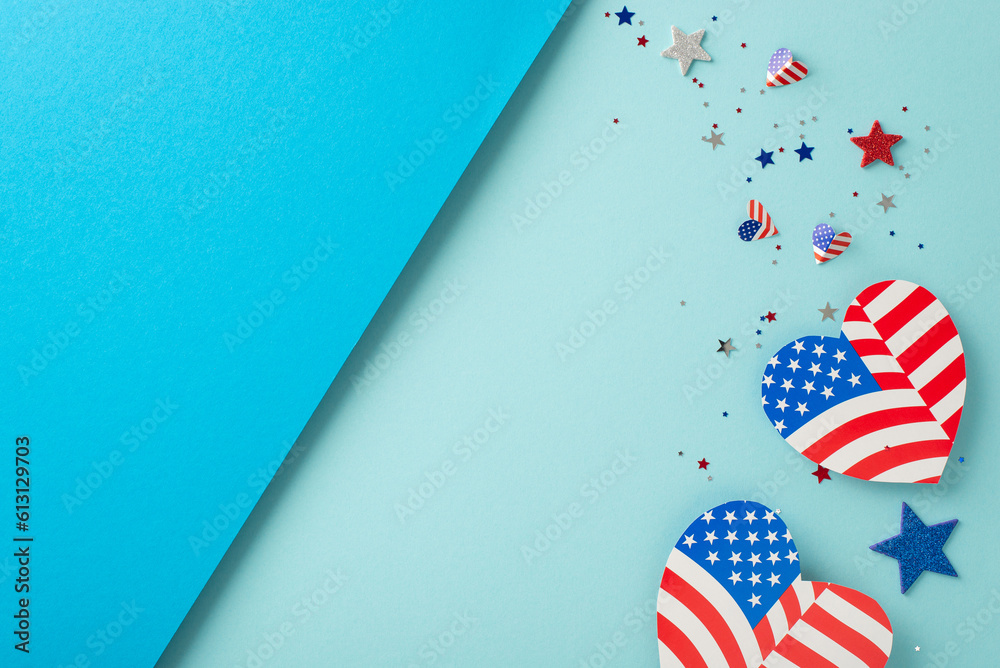 Fototapeta premium Constitution Day USA imaginative congrats. Top view of symbolic adornments: hearts featuring American flag design, glittering stars, shiny confetti on bicolor backdrop with vacant space for text or ad