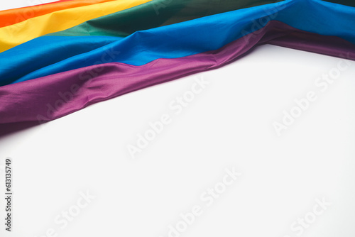 Part of the rainbow flag or LGBTQ flag is on a white background. Pride month.