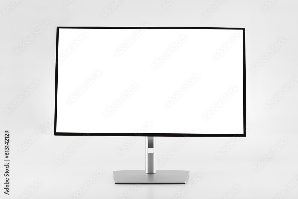 Metallic silver computer LED display monitor on white isolate background straight angle. Metallic silver computer LED display monitor on white isolate background straight angle.