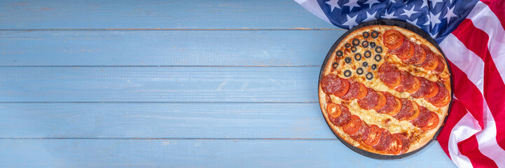 july 4th holiday party pizza, Fourth of July, Patriotic Independence day festive and picnic food. Pepperoni, tomato and black olive pizza with lot of mozzarella, in form of American flag