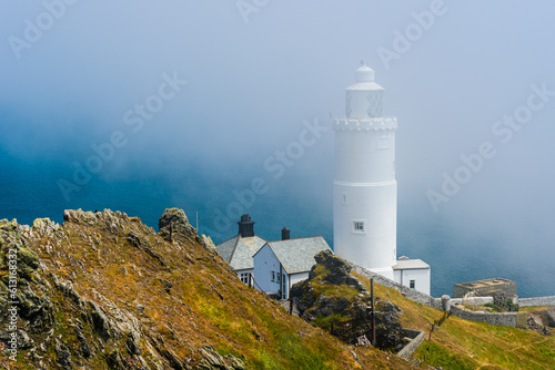 Sea Fret over Start Point Lighthouse  Trinity House and South West Coast Path  Devon  England