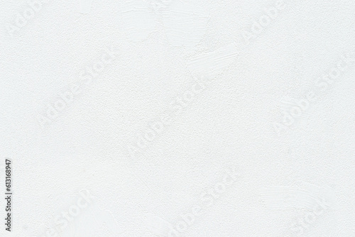 Empty blank concrete white rough wall for background and texture. Beautiful white cement wall plastered surface background pattern. Clean white wall advertising backdrop. photo