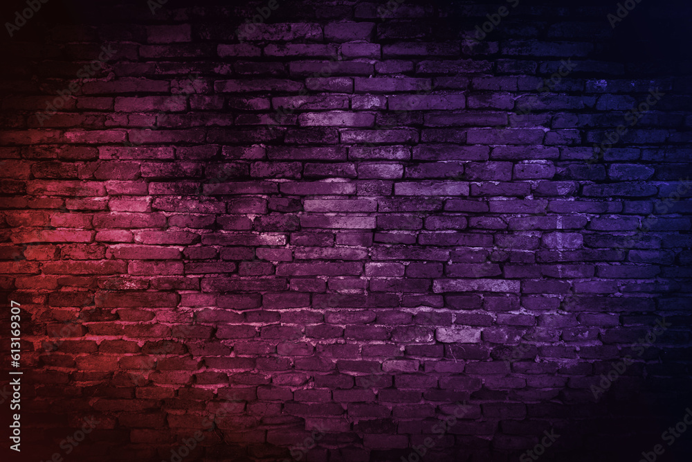 Neon light on brick walls that are not plastered background and texture. Lighting effect red and blue neon background of empty brick basement wall. Neon light on brick walls that are not plastered background and texture. Lighting effect red and blue neon background of empty brick basement wall.