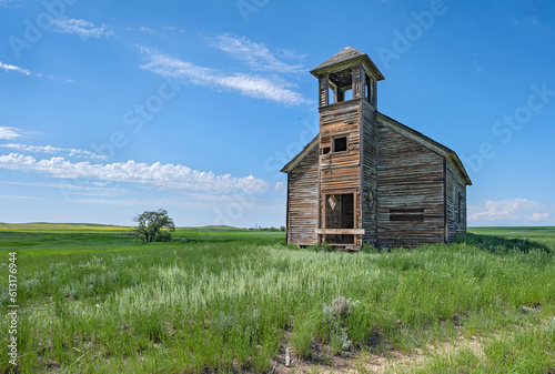 Abandoned wooden Cottonwood Lutheran Church on the plains near Havre, Montana, USA photo