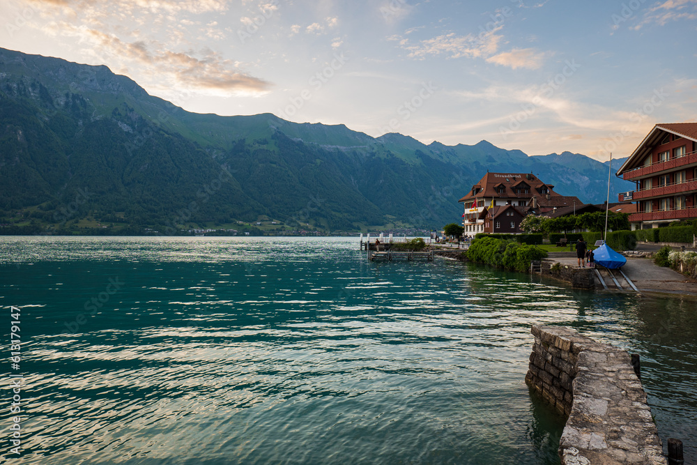 Beautiful sunset in famous small tourist village Iseltwald, Switzerland. No people