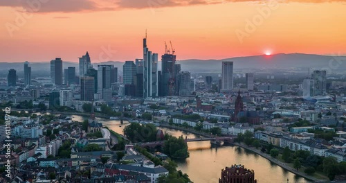 sunset over frankfurt skyline photo