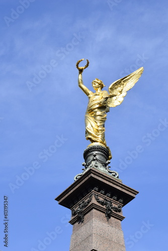 Golden angel statue on the monument for Johann Andreas von Liebenberg, Mayor of Vienna during the Second Siege of Vienna by the Turks in 1683. Monument inaugurated in 1890. It is in Vienna, Austria.