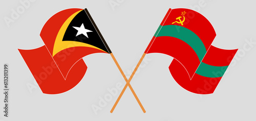 Crossed and waving flags of East Timor and Transnistria