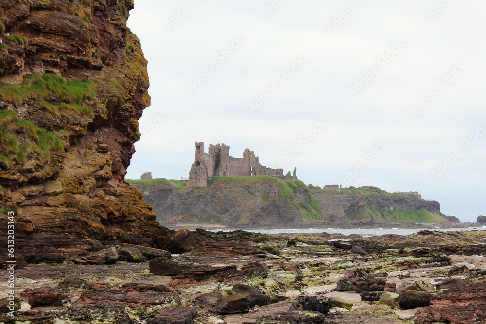 Incredible views of Tantallon Castle in East Lothian, Scotland.  The ancient castle sits atop the cliff side with the ocean looking out beyond it.