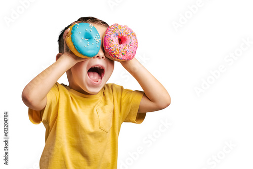 Fotografie, Tablou Happy cute boy is having fun played with donuts on png background
