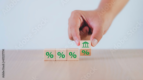 Foto Hand picking wooden blocks