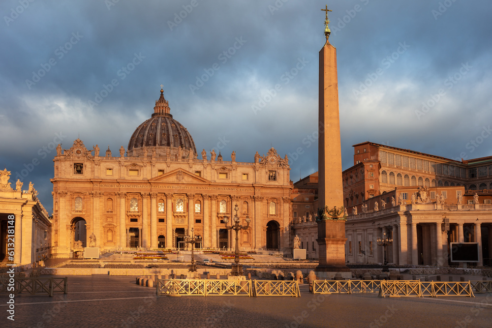 Vatican City, Rome, Italy. Cityscape image of illuminated Saint Peter's Basilica and St. Peter's Square, Vatican City, Rome, Italy at sunrise.