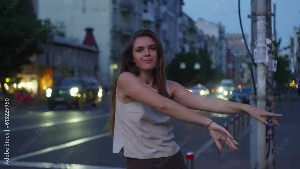 The girl blossoms in the rhythm of the mystical night. Her body dances like the wind on the streets in the light of car headlights. High quality 4k footage The girl blossoms in the rhythm of the mystical night. Her body dances like the wind on the streets in the light of car headlights. High quality 4k footage