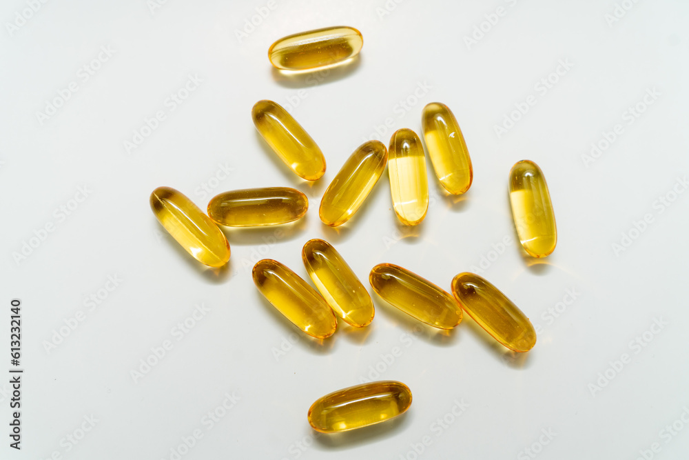 fish oil capsules on white background fish oil capsules on white background