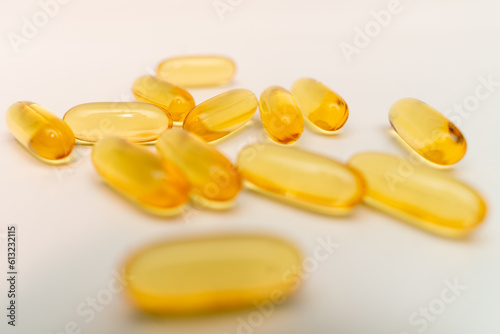 fish oil capsules on white background 