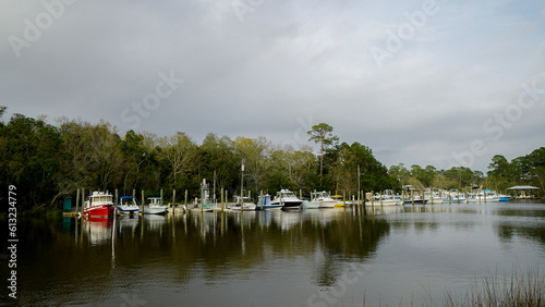Boats in a small marina in Ocean Springs, MS