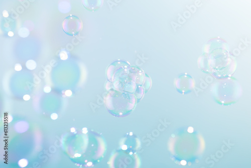 Beautiful Transparent Shiny Soap Bubbles Floating in The Air. Soap Sud Bubbles Water. Abstract Background	
