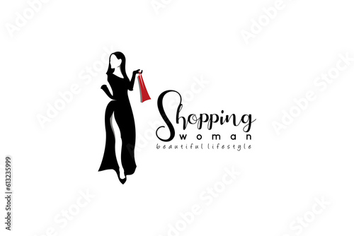 Vector silhouette of beautiful woman carrying shopping bags, logo of woman shopping and fashion