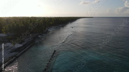 Wallpaper Mural Aerial view of tropical beach landscape at Fuvahmulah island, a famous dive site for tiger sharks in South Maldives. Summer holiday and vacation travel concepts. 4K footage drone video Torontodigital.ca