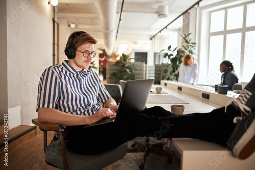 Young businessman working online with a laptop