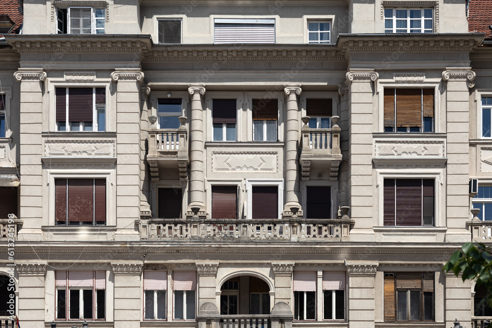 Facade of the neoclassical residential building. Building in Novi Sad, Serbia.