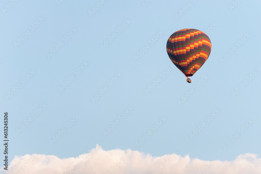Fototapeta premium Hot air balloon against blue sky