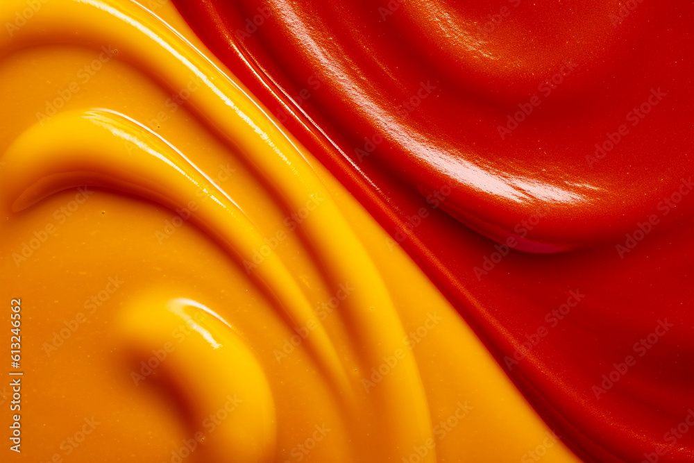 tasty red ketchup and yellow mustard texture, top view, close up