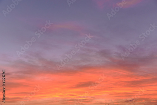 Sky light after sunset. orange background, clouds © Raul