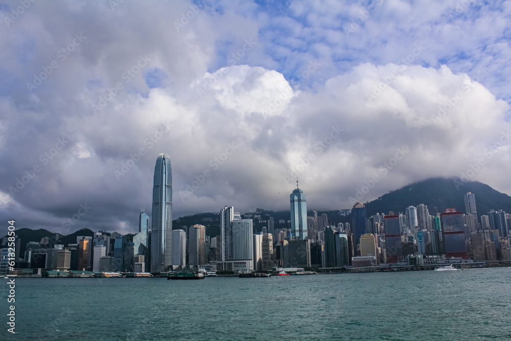 Fototapeta premium The view of Victoria Harbour, Hong Kong city. A city full of skyscrapers. Travel scene.